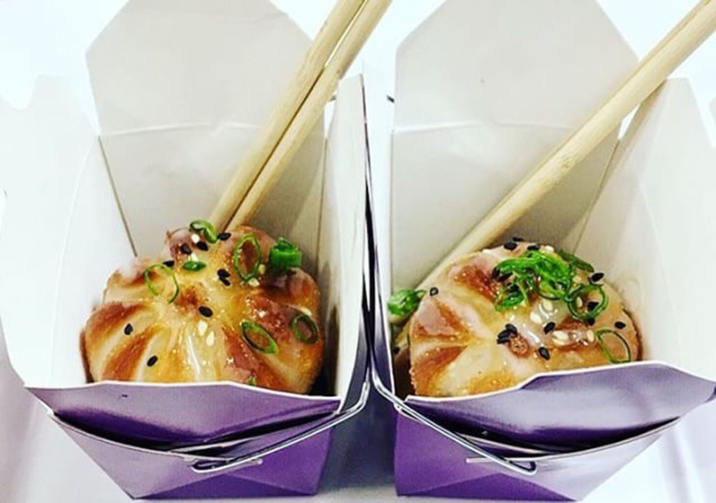 Appetizers served in unique take out containers