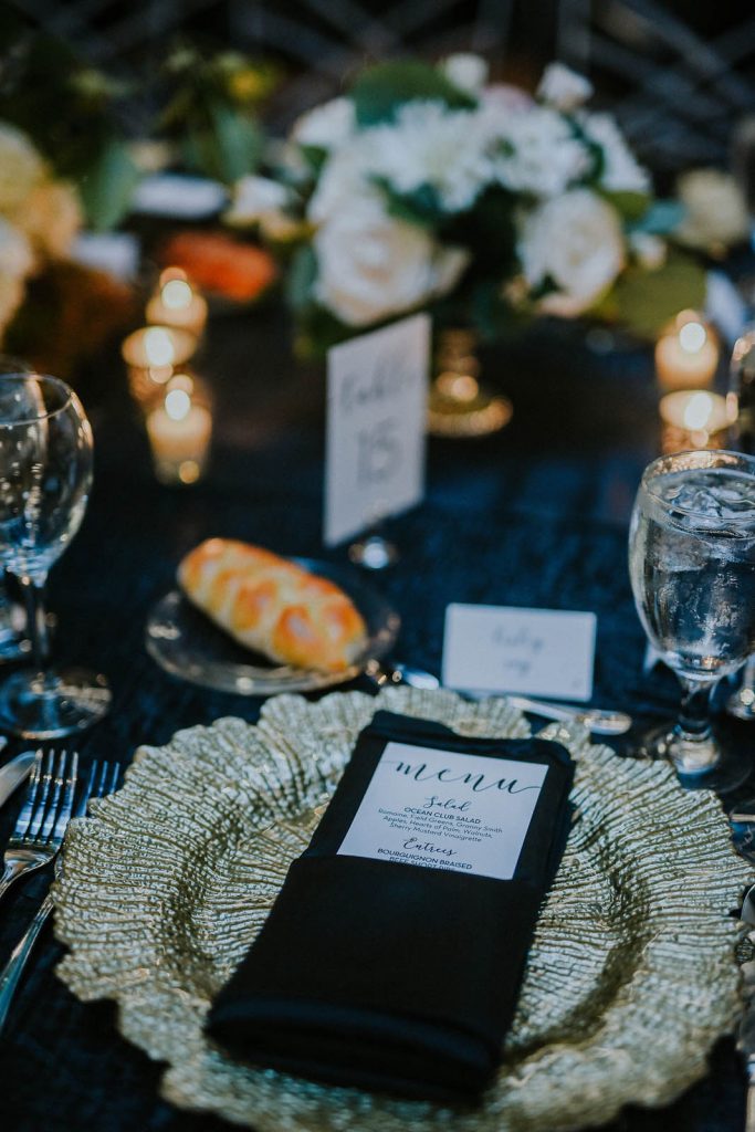 menu cards and place settings for a wedding